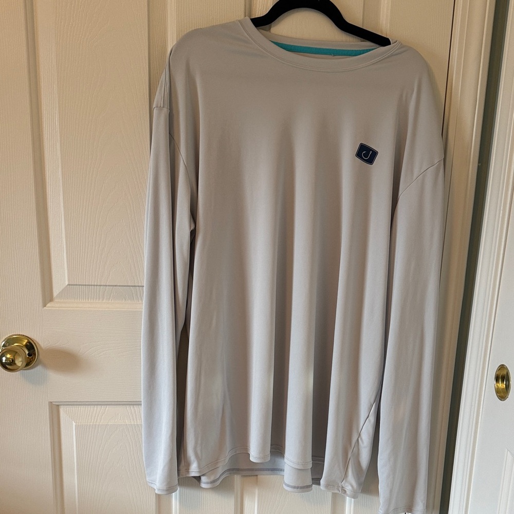 Light Gray Long-Sleeve Performance Tee with Subtle Logo